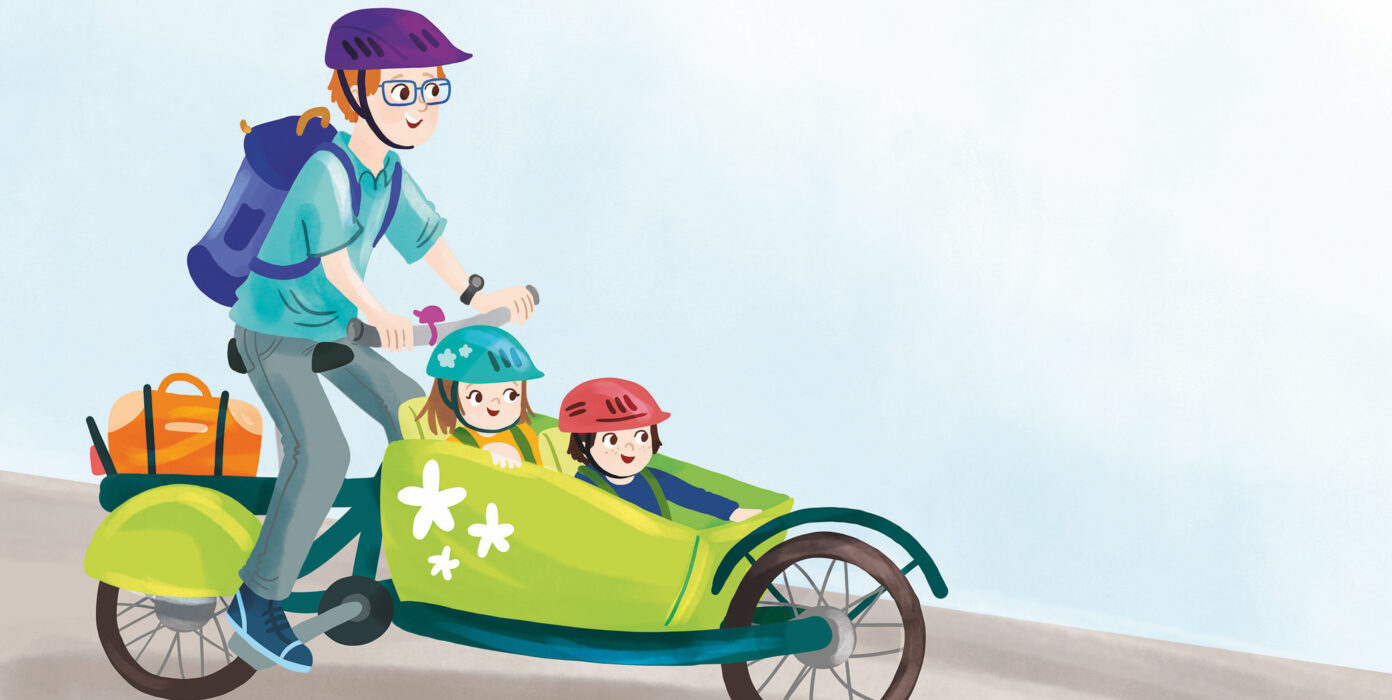 Zwei Kinder in einem Lastenrad.