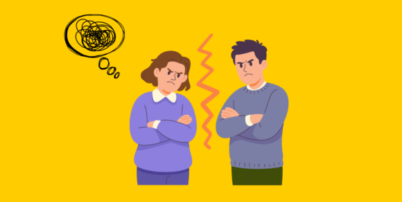 Eine Frau und ein Mann stehen mit finsterem Blick voreinander, die Arme verschränkt